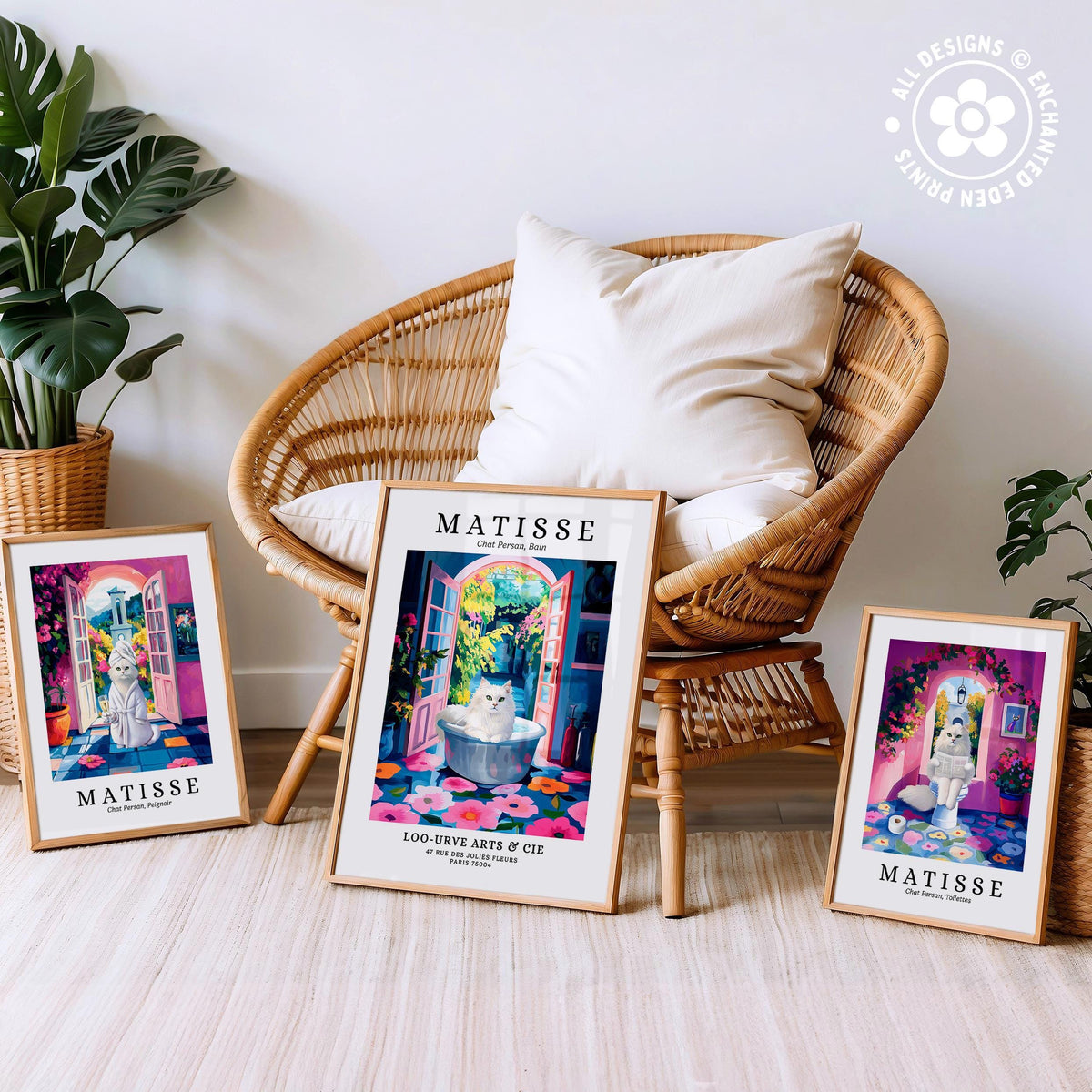 three framed artworks of the famous French artist Matisse, displayed on a wooden floor in front of a wicker chair.