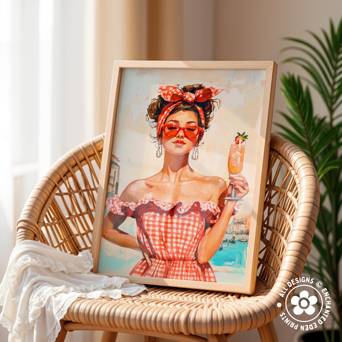 A framed painting of a woman in a red and white checkered dress, wearing a red headband and sunglasses, holding a drink, is displayed on a wicker chair.