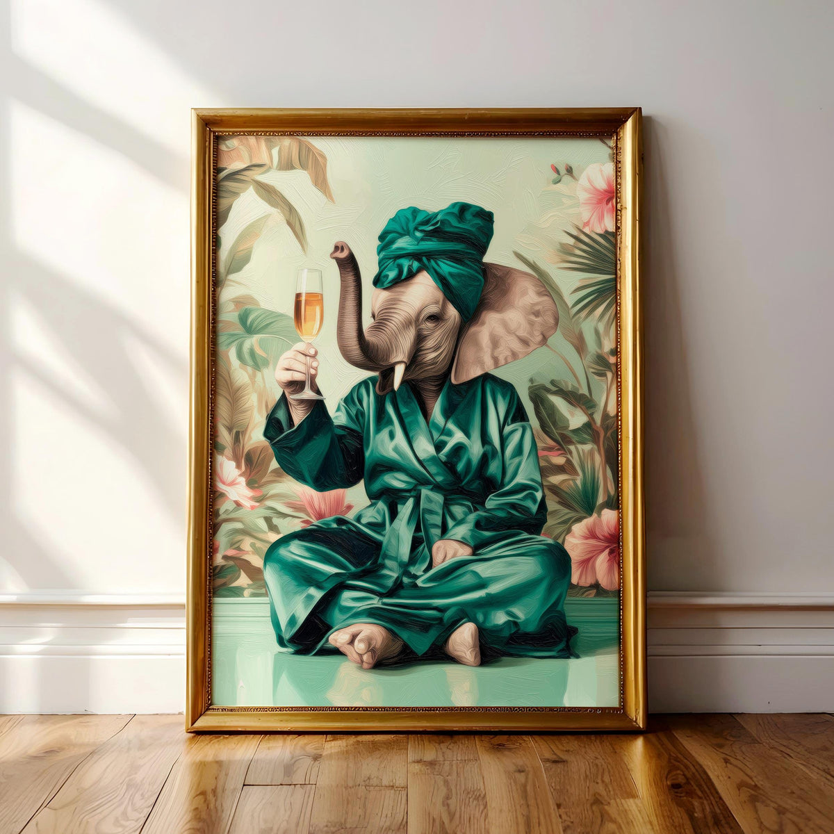 A framed painting depicting an elephant wearing a green robe and holding a glass of wine, sitting on a green surface against a tropical background.
