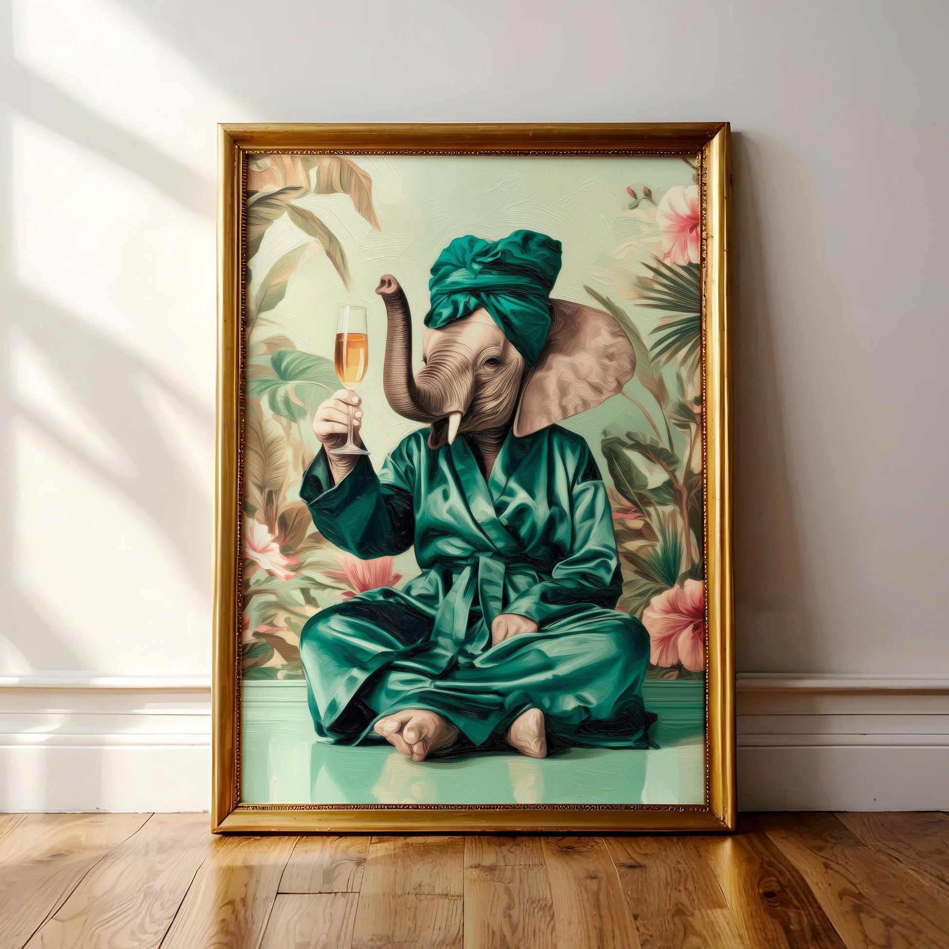 A framed painting depicting an elephant wearing a green robe and holding a glass of wine, sitting on a green surface against a tropical background.